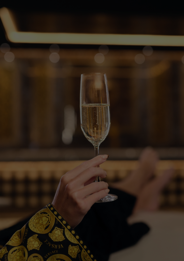 KEF SPA Versace robe champagne glass woman nails hot tub tiles luxury travel hotel keflavik iceland